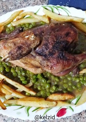 Une photo de Tajine aux petit pois / poulet / frites
