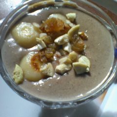 A picture of Chocolate phirni with white ball.