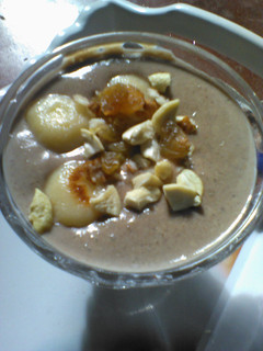 A picture of Chocolate phirni with white ball.