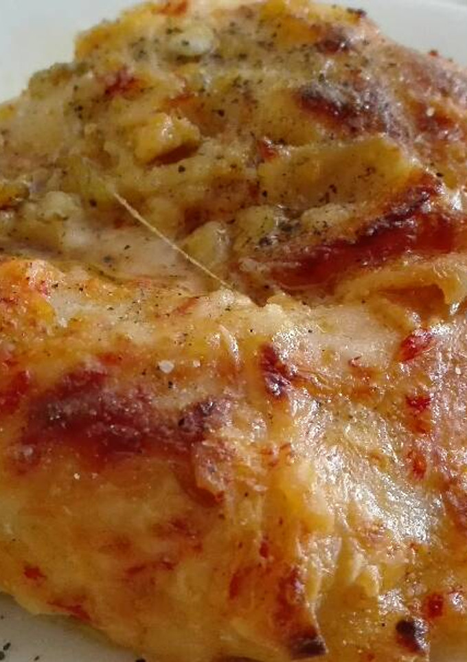 Una foto de Canelones de panga y gambas con bechamel de pimientos del piquillo