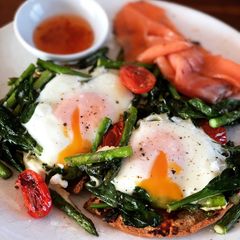 A picture of Baked Eggs on Toast with Smoked Salmon & Asparagus.