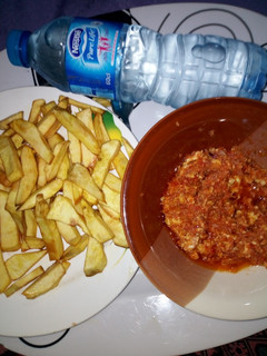 A picture of Egg sauce with fried potatoes.