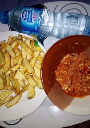 A picture of Egg sauce with fried potatoes.