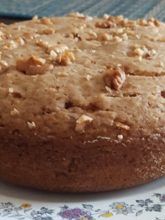 A picture of Eggless Wheat Banana Walnut cake.