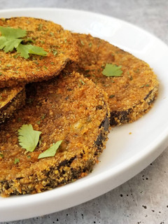 A picture of Baked Eggplant Slices With Crispy Garlic Parmesan Coating.