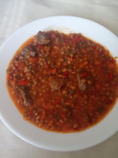 Una foto de Lentejas estofadas con galta de cerdo