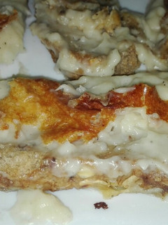 Una foto de Tostadas de bechamel y queso
