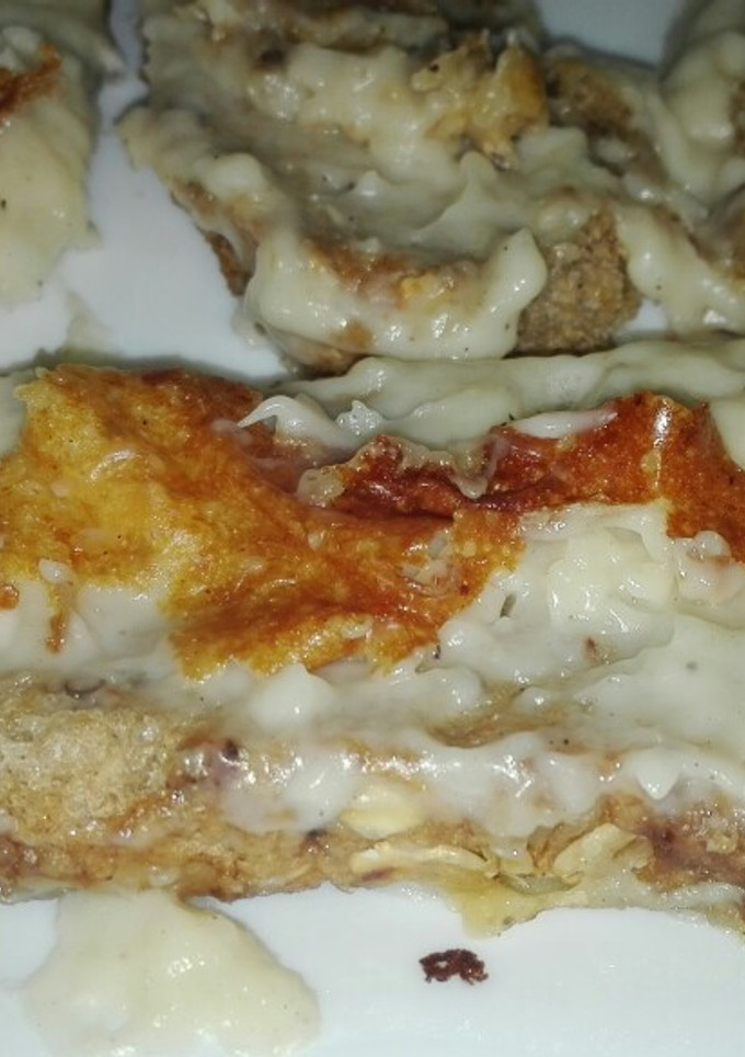 Una foto de Tostadas de bechamel y queso