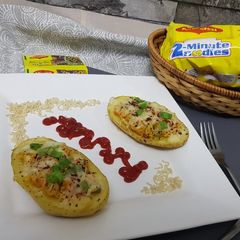 A picture of Maggi stuffed jacket potatoes.