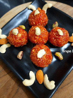 A picture of Gajar halwa ladoos with dry fruits.