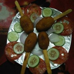 A picture of Veg rice lollipops.