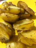 Gajos de papas condimentadas al horno