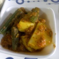 A picture of Bhindi potato vegetable in green masala.