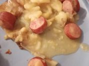 A picture of hotdogs sliced