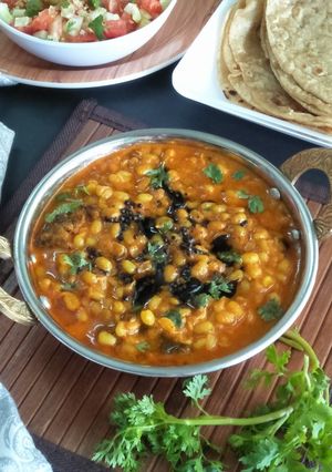 A picture of MUGAA AAMBAT (Sprouted Whole Green Moong Curry Vegetable).