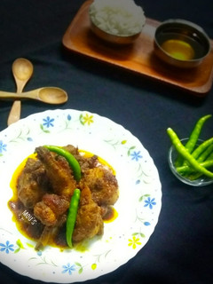 A picture of SHORSHE MURGI(CHICKEN in CURRIED MUSTARD SAUCE).