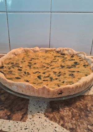 Una foto de Tarta con cebollas de verdeo