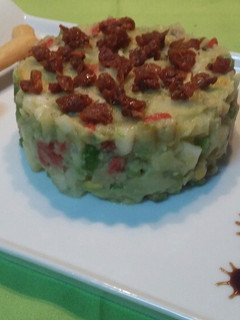 Una foto de Timbal de patata aliñada