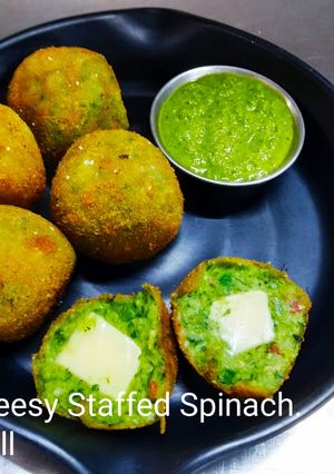 A picture of Crispy cheesy stuffed spinach khichu ball.