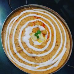 A picture of Butter chicken 😋🍴.