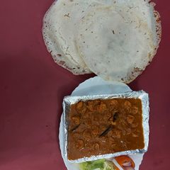 A picture of Prawns ghassi and uppam.