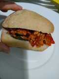 Mollete de pollito con pimientos