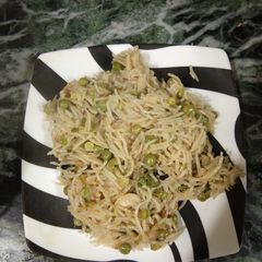 A picture of Green peas pulao in pressure cooker.