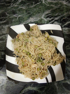 A picture of Green peas pulao in pressure cooker.