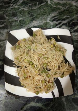 A picture of Green peas pulao in pressure cooker.