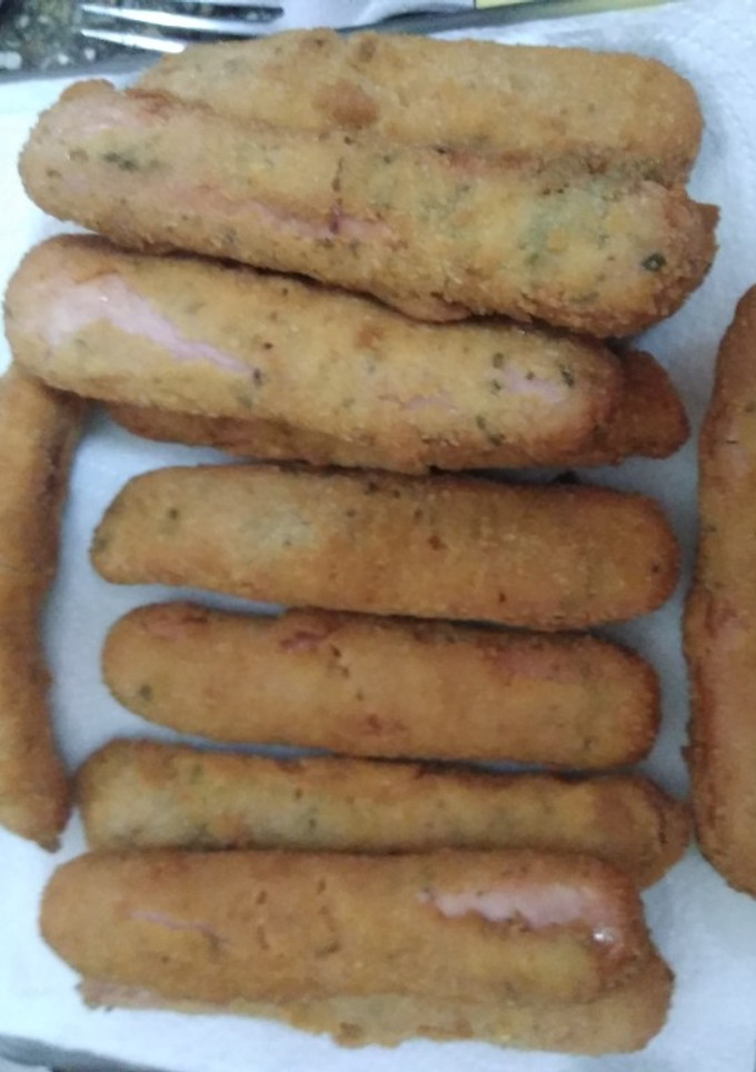 Una foto de Salchicha con pan rallado🤩