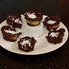 A picture of Brownie Bottom Vanilla Butter Cake Cupcakes.