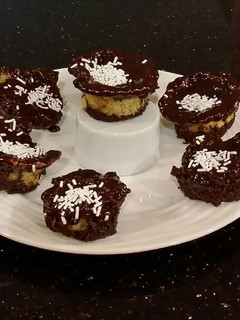 A picture of Brownie Bottom Vanilla Butter Cake Cupcakes.