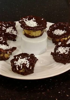 A picture of Brownie Bottom Vanilla Butter Cake Cupcakes.