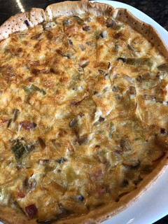 Una foto de Quiche bacon y champiñones