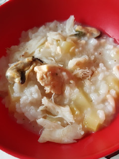 Una foto de Arroz cremoso con pescado y calabacín