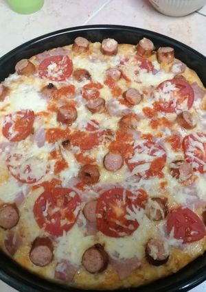 A picture of Choma sausage pizza.