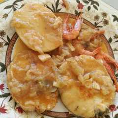 Foto principal de Guiso de merluza con patatas y gambas