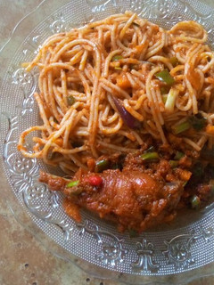 A picture of Spaghetti and chicken.