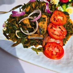 A picture of Creamy Yam Porridge with Spinach.