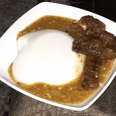A picture of Tuwon masara with okro soup.