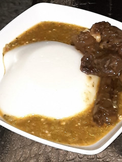A picture of Tuwon masara with okro soup.