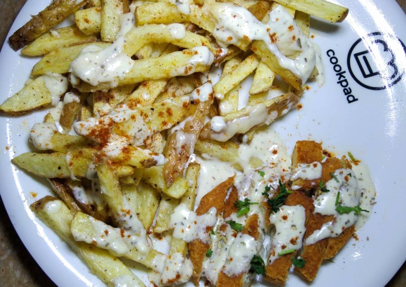 Cheesy Chicken fries with yogurt herb Sauce