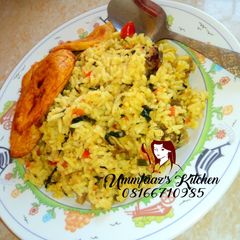 A picture of Jellof rice and plantain.
