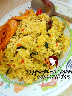 A picture of Jellof rice and plantain.