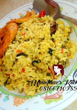 A picture of Jellof rice and plantain.