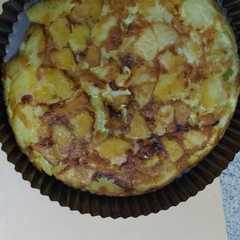 Una foto de Tortilla de papas rellena
