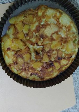 Una foto de Tortilla de papas rellena