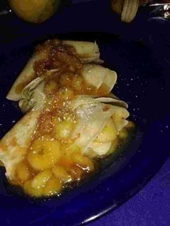 Una foto de Panqueque relleno con plátanos