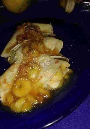 Una foto de Panqueque relleno con plátanos