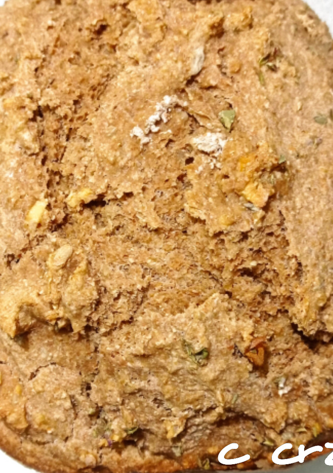 Una foto de Pan rápido integral con ajo y orégano (panificadora Moulinex PD)